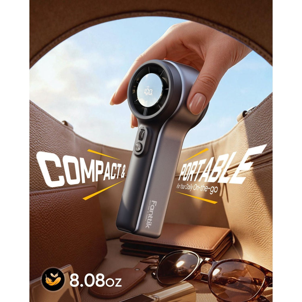 Hand holding a GoFlow 11 Apex Handheld Fan with text 'Compact & Portable' against a car interior background.