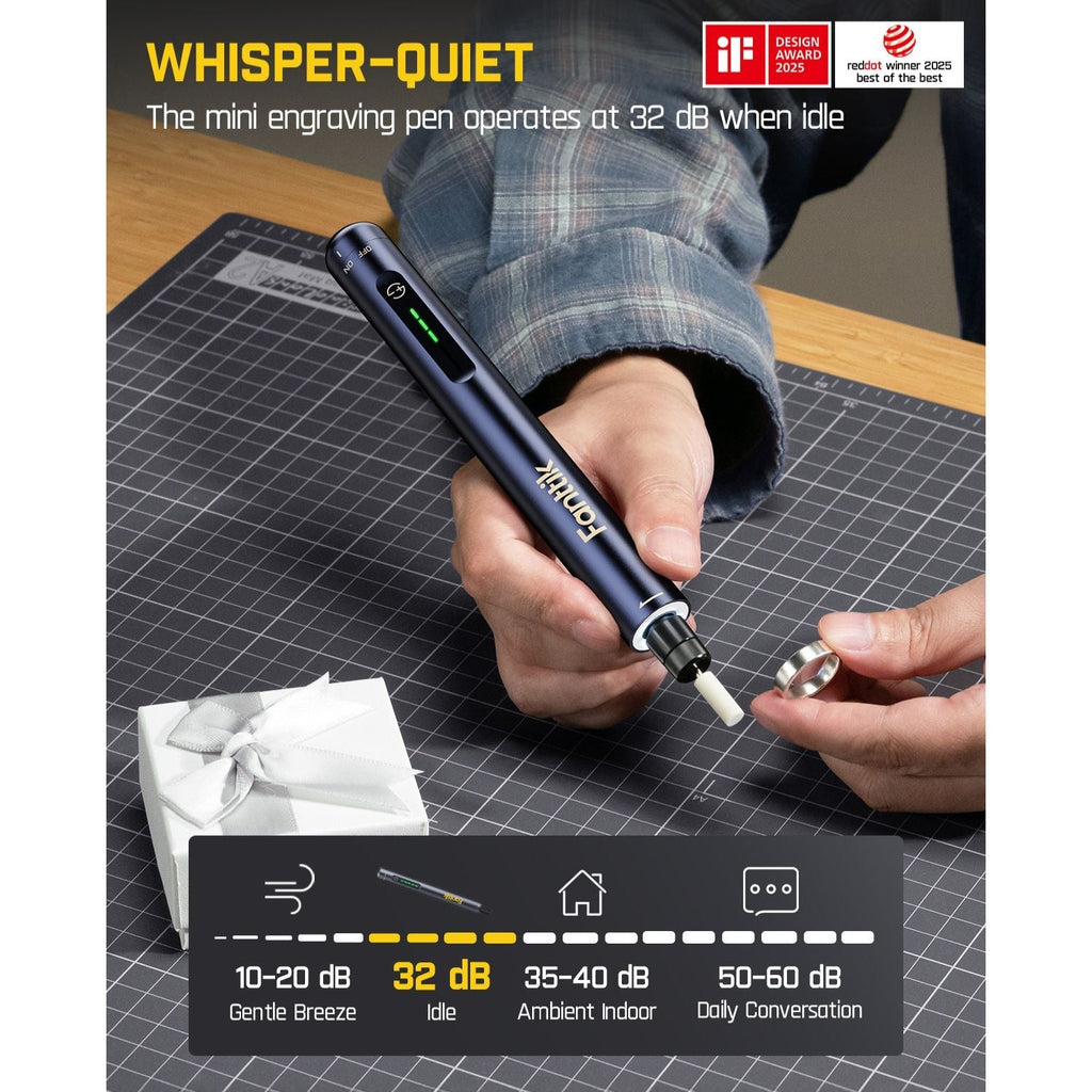 Person using a Fanttik F2 Master Mini Cordless Rotary Tool Kit 4V on a cutting mat with product details displayed.