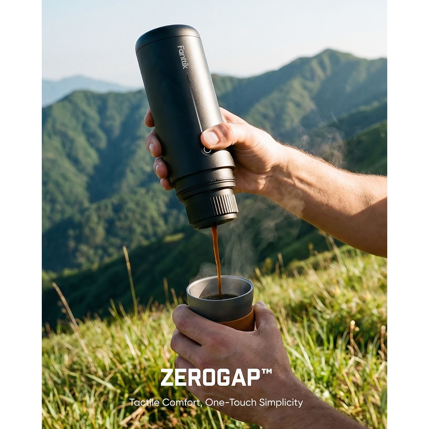 Person pouring coffee from a ZEROGAP Fanttik Cafein 11 Portable Coffee Machine into another cup against a mountainous background.