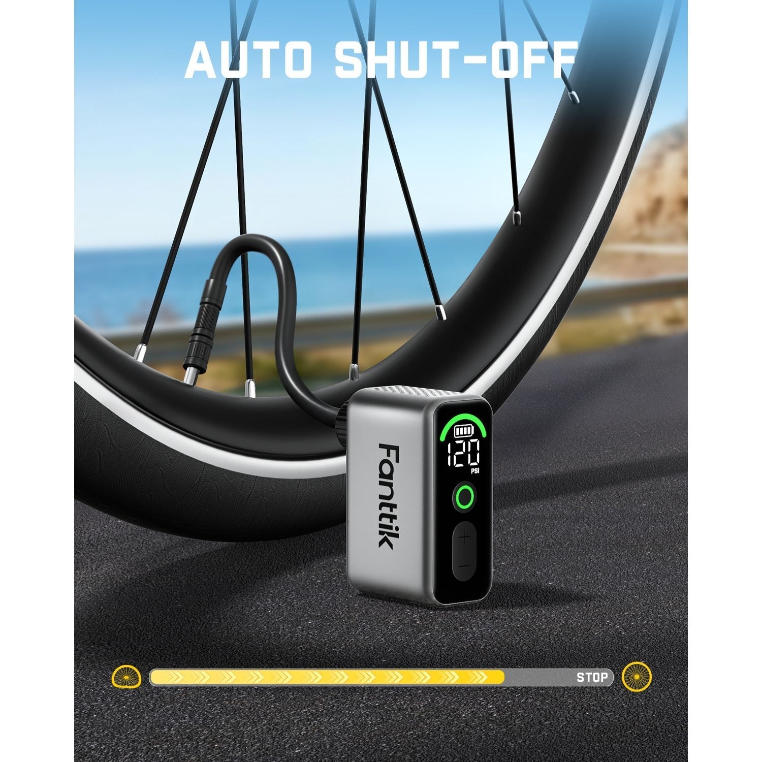 Fanttik X10 Ace tiny bike pump with digital display showing 120 PSI and auto shut-off feature near a bicycle wheel.
