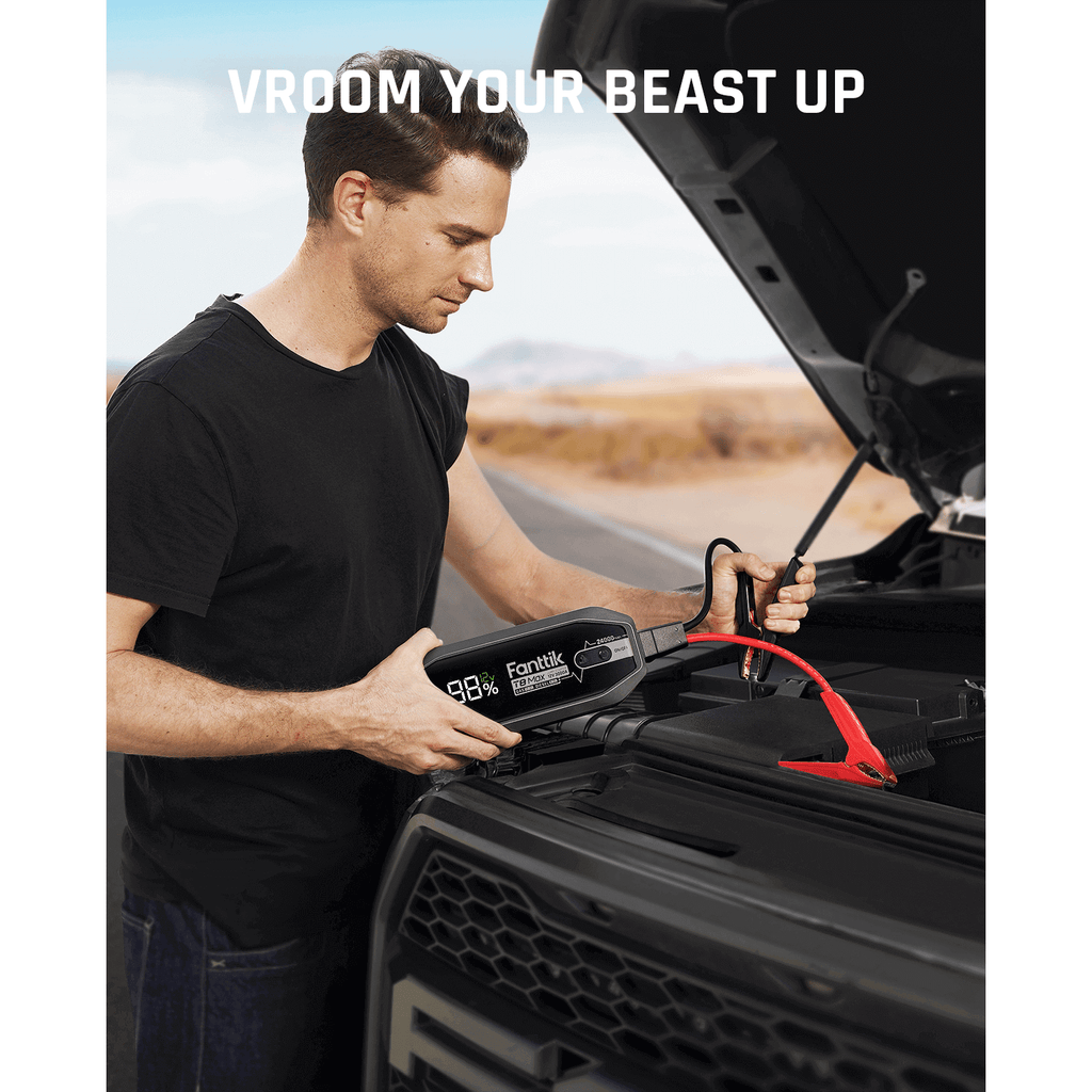 Man using Fanttik T8 MAX 4000 Amp jump starter with 98% battery on car engine