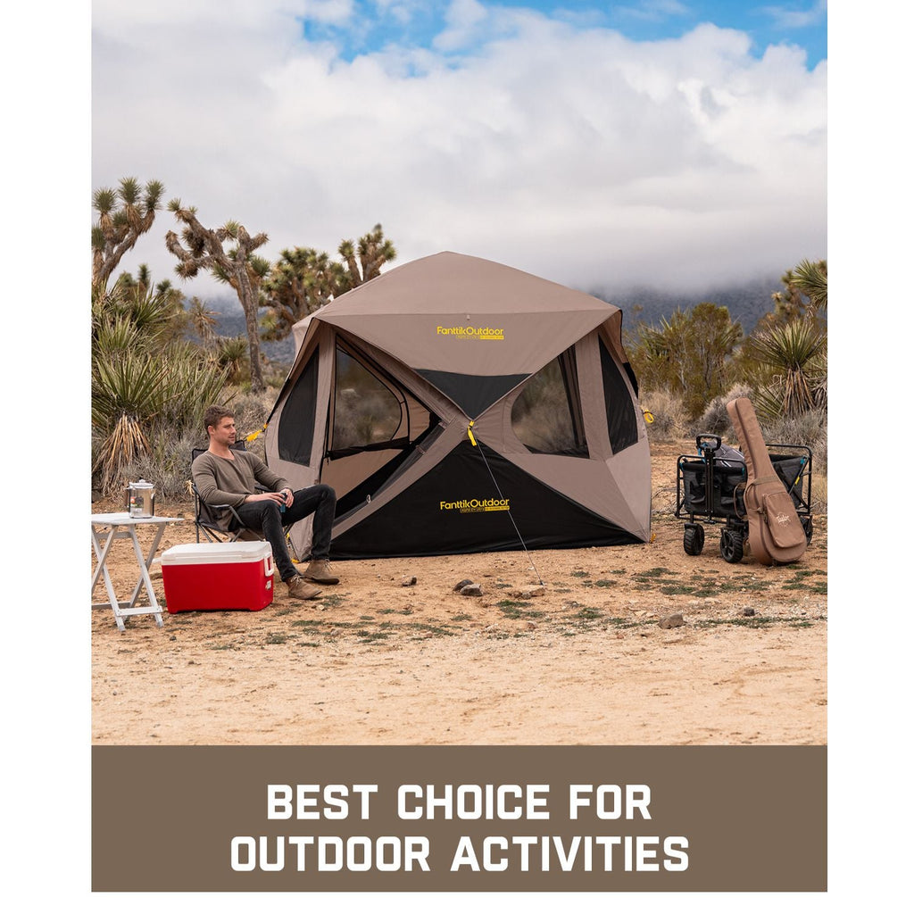 FanttikOutdoor Alpha C4 Ultra instant cabin tent set up in desert, with a man relaxing. Perfect for outdoor activities.