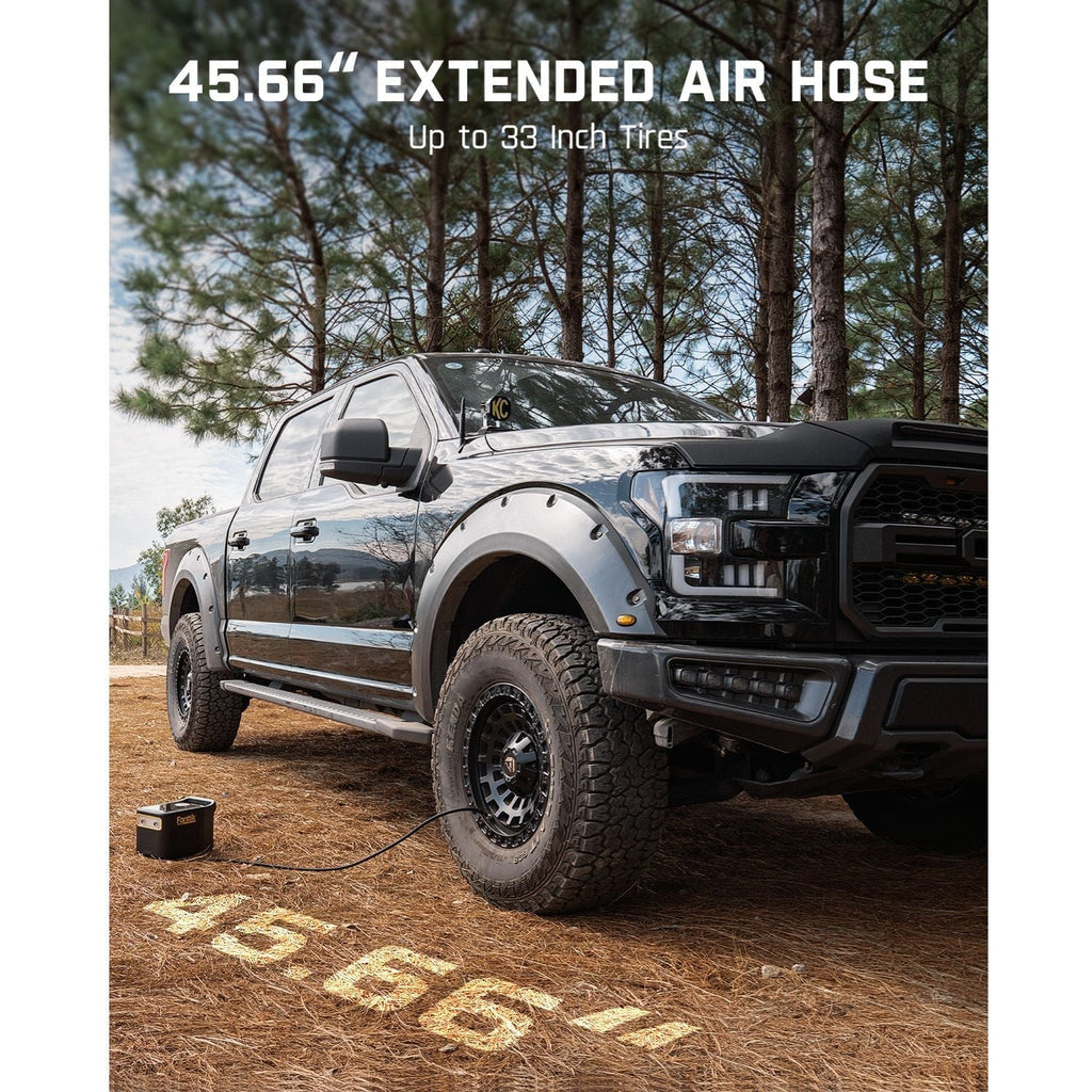 Fanttik X9 Ultra tire inflator with 45.66" extended air hose for up to 33-inch tires, connected to a black pickup truck.
