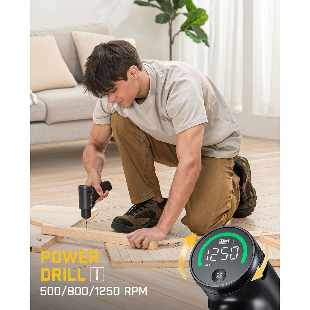 Man using Fanttik K2 Ultra 7.4V cordless power drill with digital RPM display for DIY wood assembly.