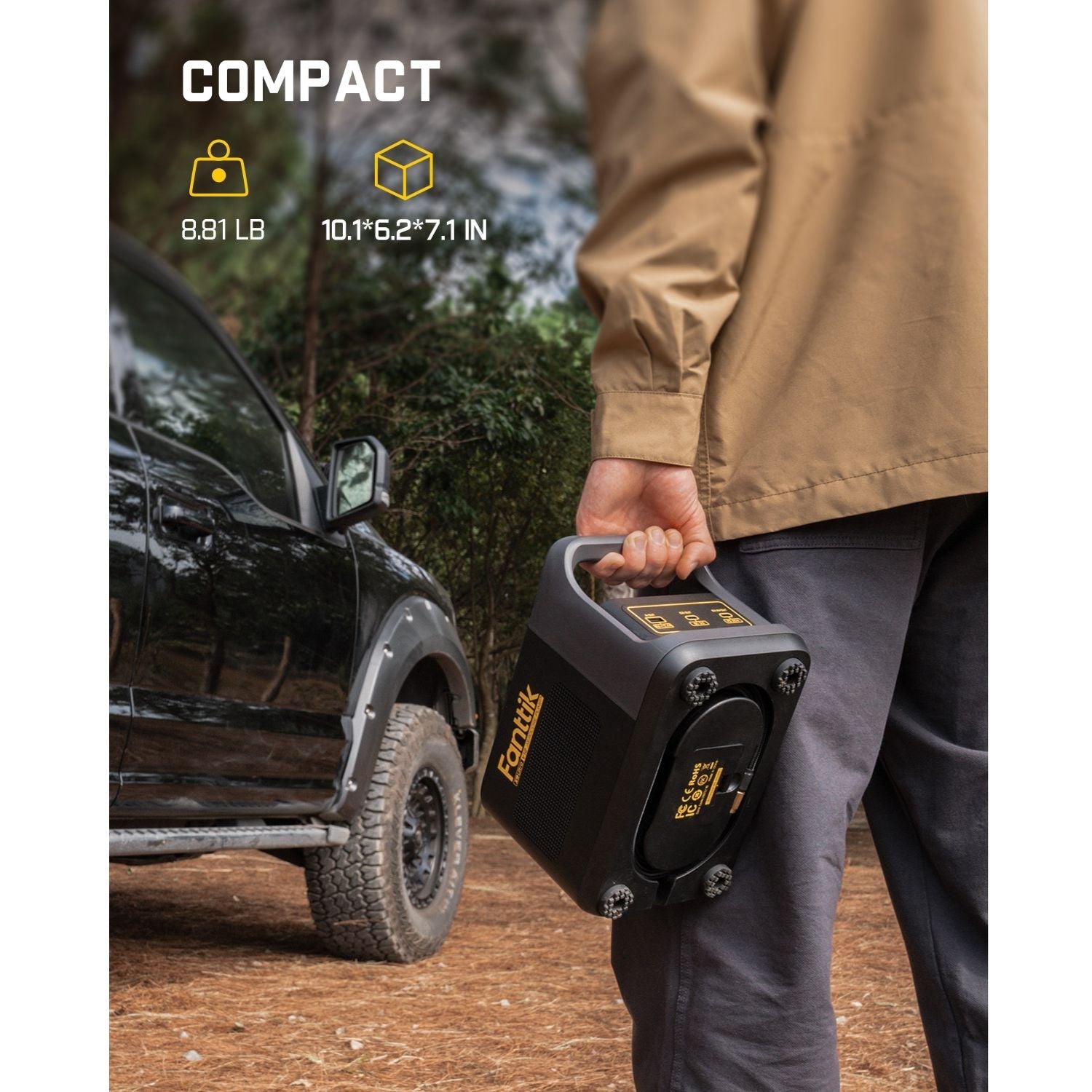 Fanttik X9 Ultra tire inflator, compact and portable, 8.81 LB, 10.1x6.2x7.1 IN, held by a person next to a truck.