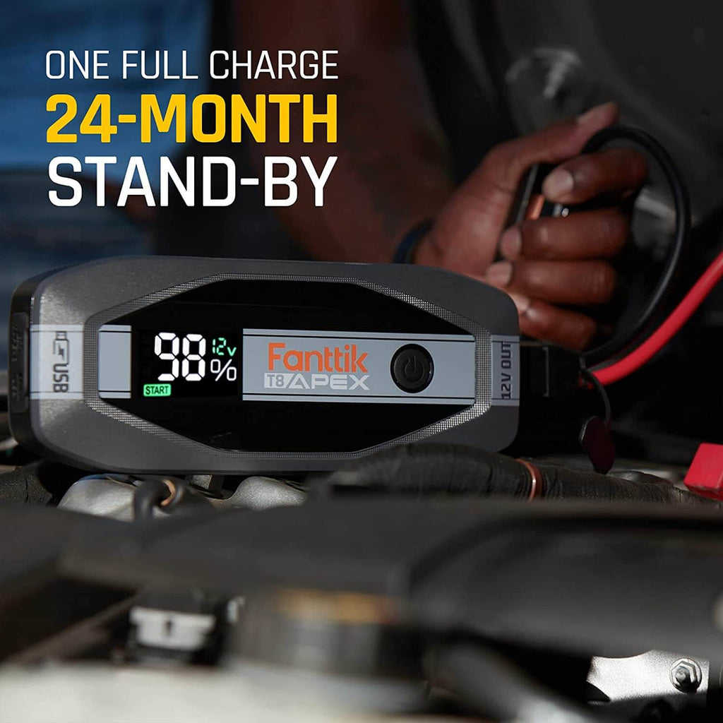 Fanttik T8 APEX jump starter with 99% charge and 24-month stand-by, ready to start a car engine.
