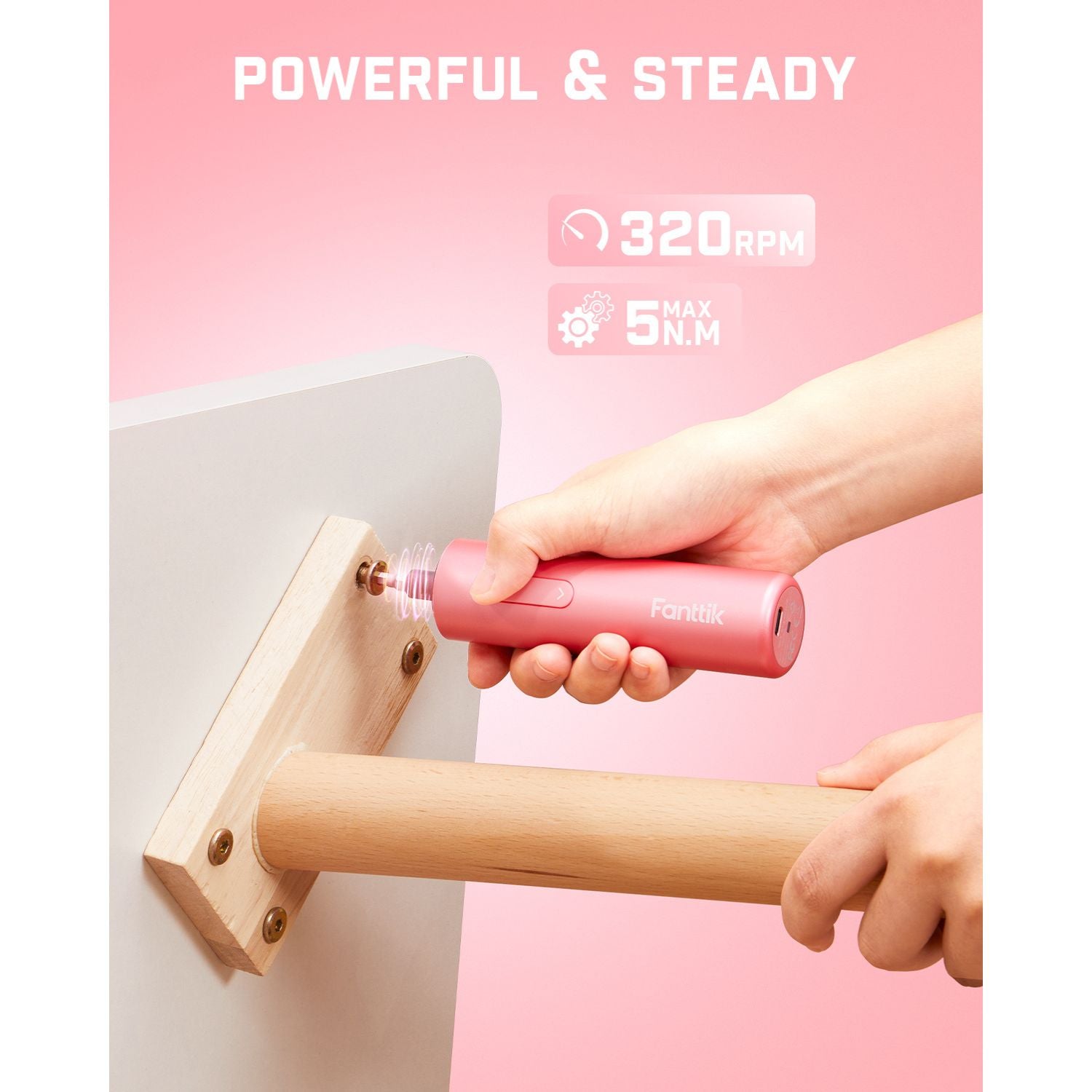 Pink Fanttik S1 Capsule cordless screwdriver in use, demonstrating 320 RPM and 5 N.M torque for furniture assembly.