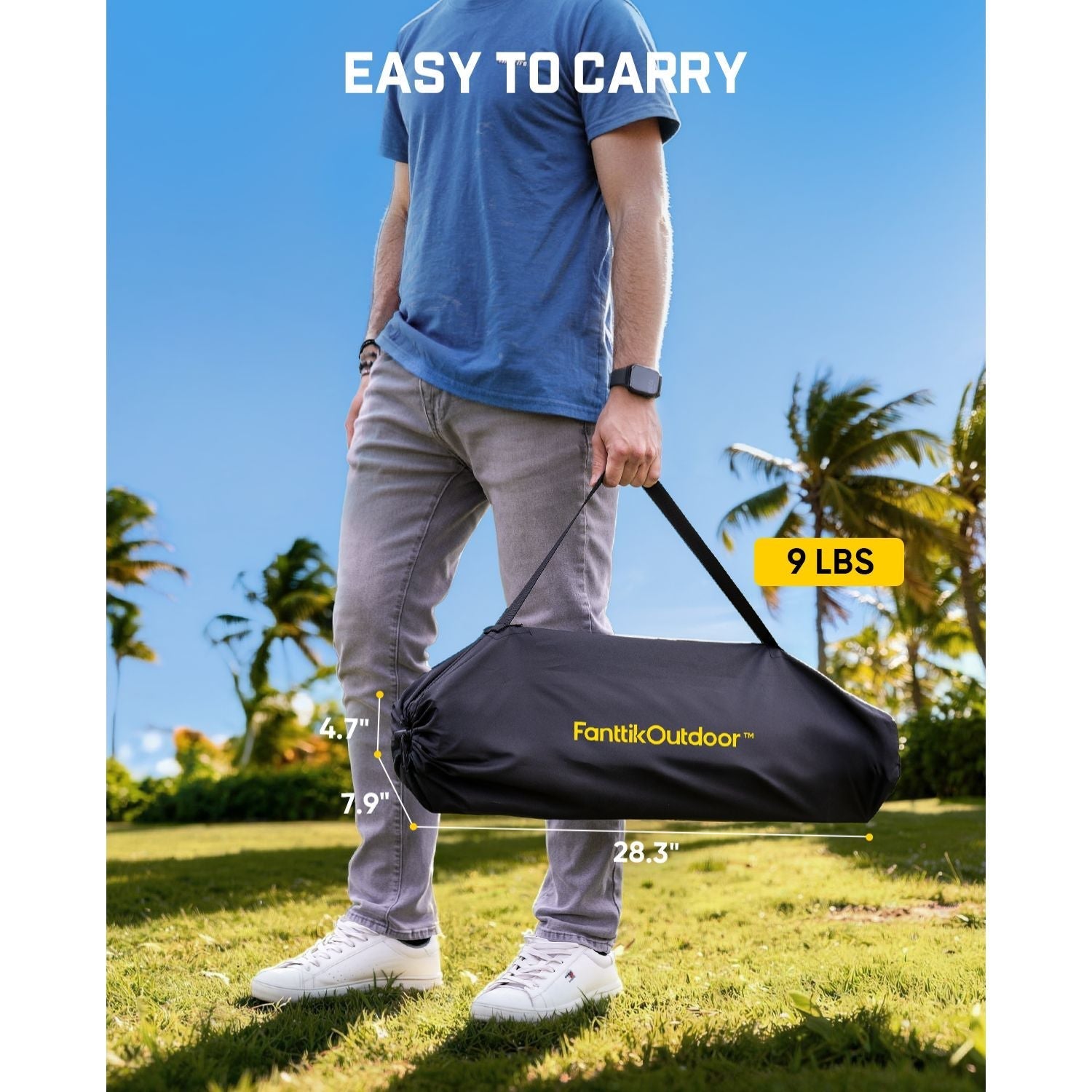 Man carrying FanttikOutdoor camping table in black carry bag, easy to carry, 9 lbs
