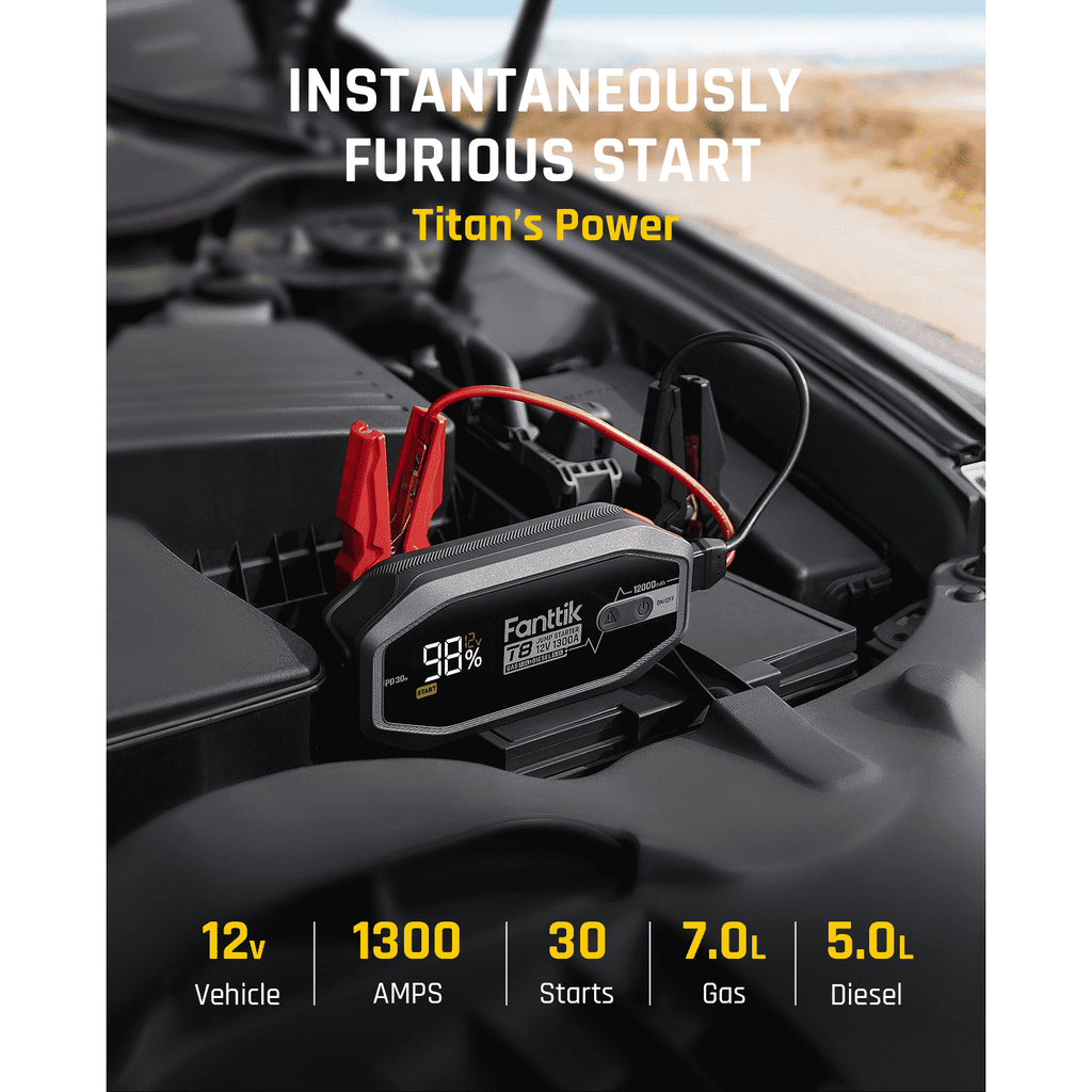 Fanttik T8 1300 Amp jump starter on car battery, showing 98% charge, 1300A, 30 starts, 7.0L gas, 5.0L diesel.