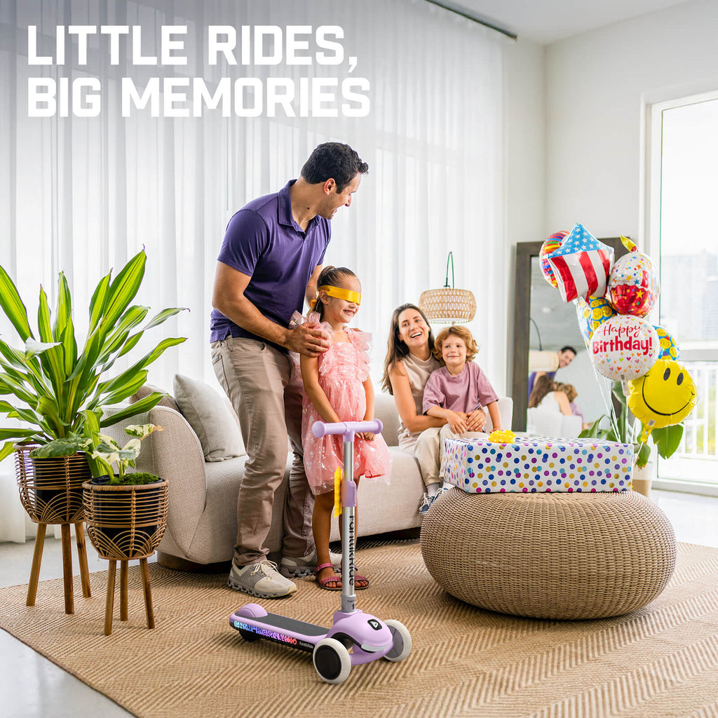 FanttikRide K9 Pro purple electric scooter for kids with happy family, birthday balloons, and gifts