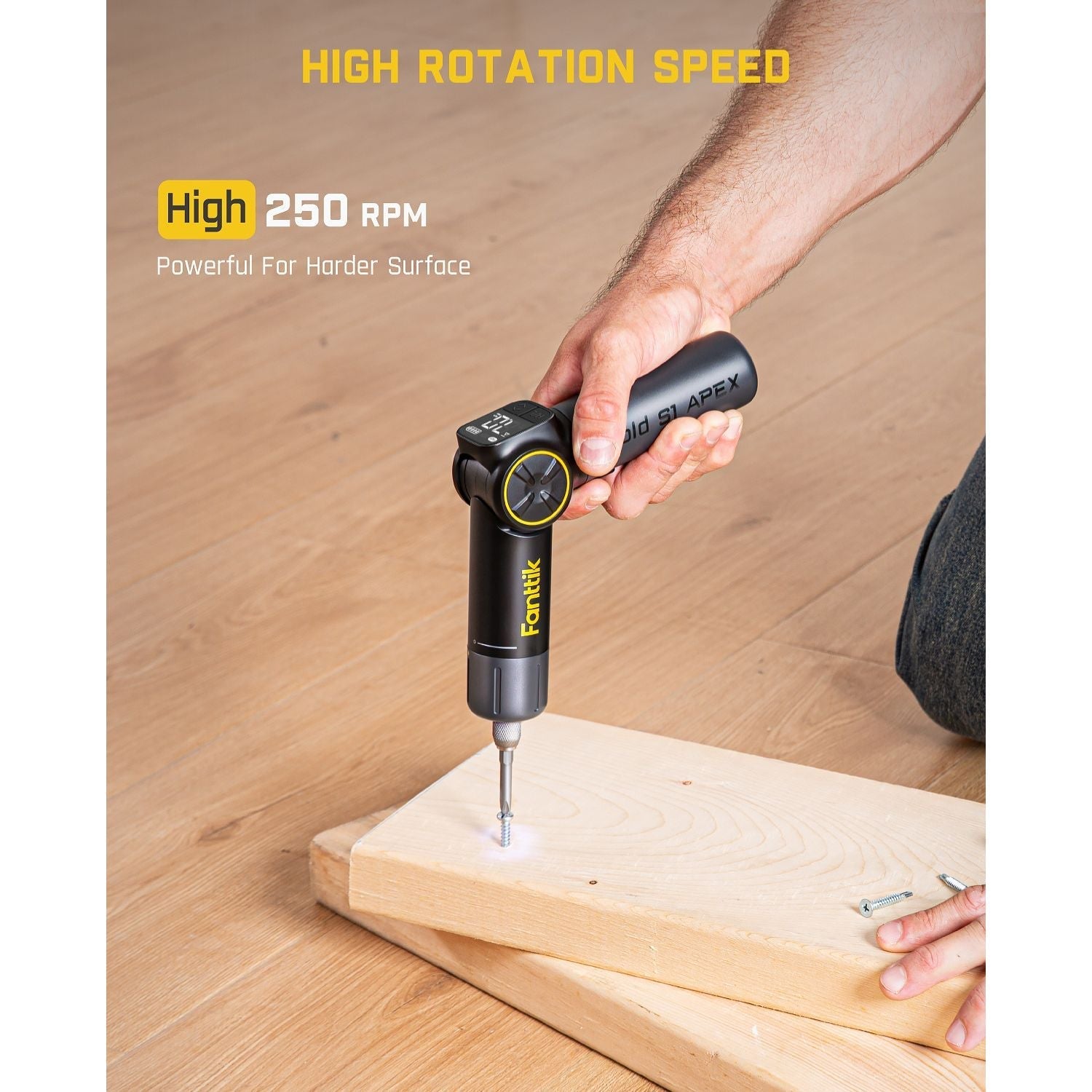 Fanttik Fold S1 APEX cordless screwdriver with LED display shows 250 RPM, driving a screw into wood.