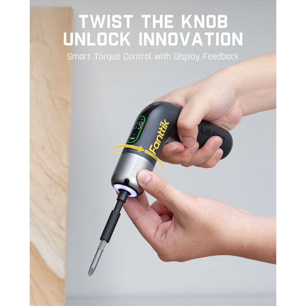 Fanttik L2 Pro cordless electric screwdriver with smart torque control and display feedback, held by hands.