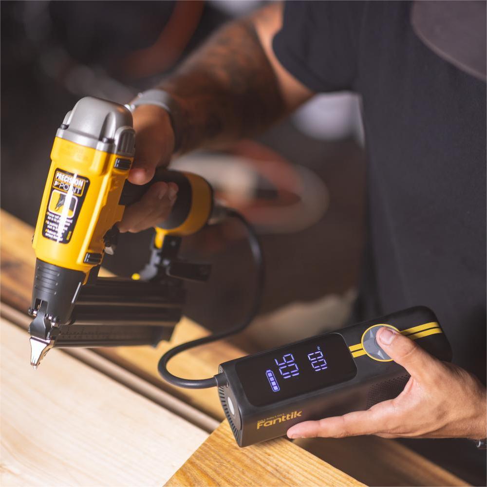 Fanttik S08 air coupler connecting a pneumatic nail gun to a portable air compressor