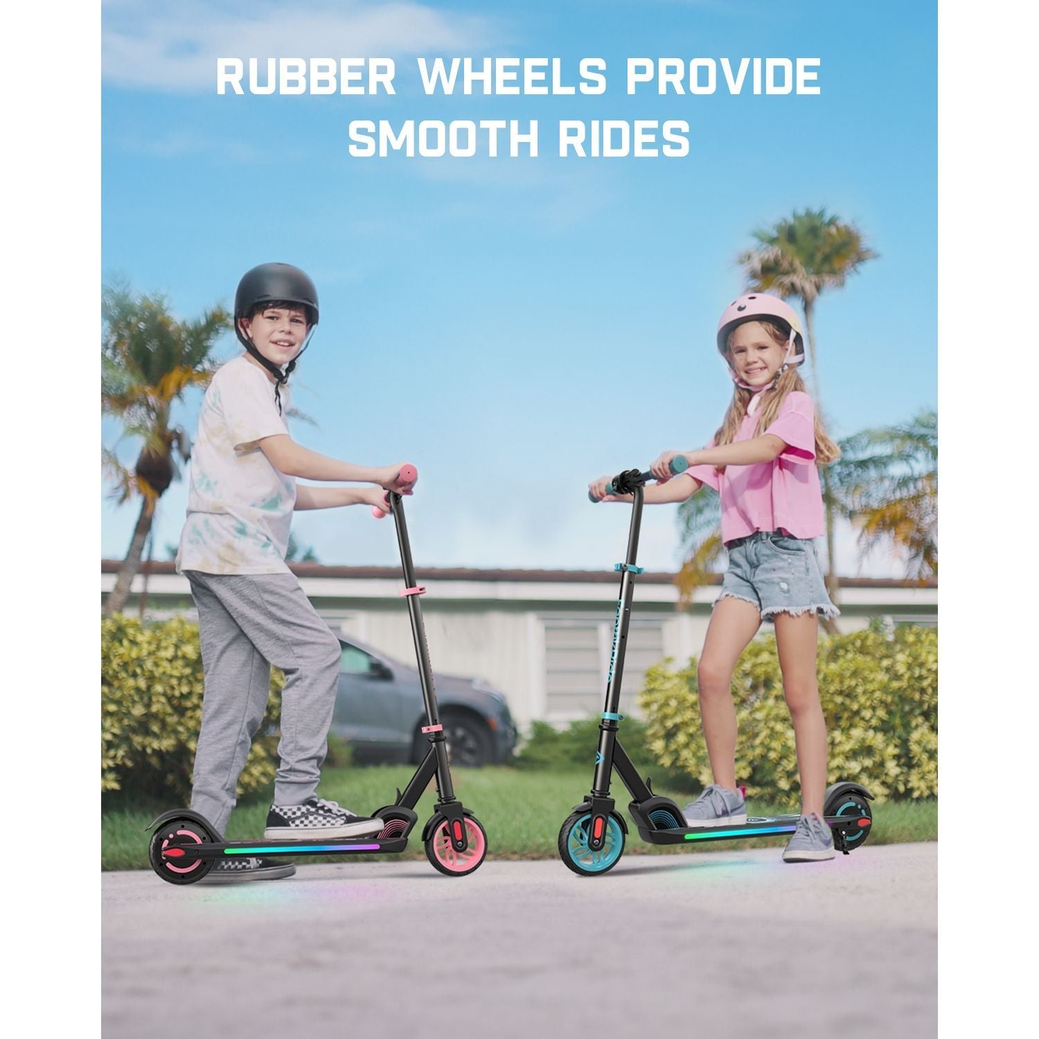 Pink and blue FanttikRide C9 Apex scooters with LED lights, ridden by children. Text: Rubber Wheels Provide Smooth Rides.
