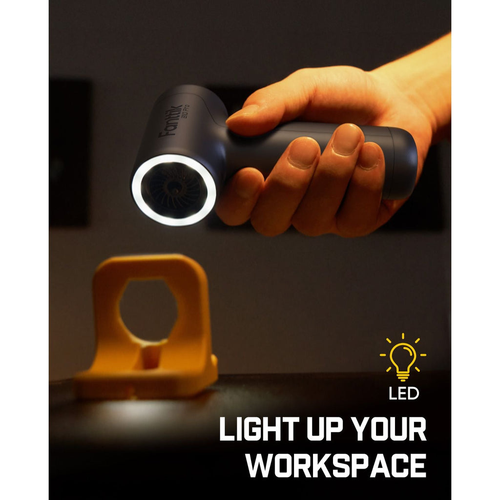 Fanttik B10 Pro electric air duster with LED ring light, held in hand