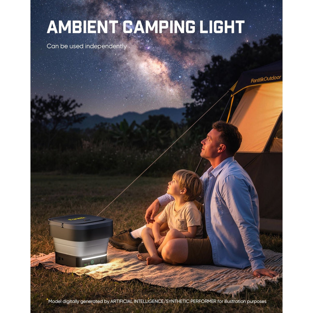 Two people sitting under a tent with a 'Famille Outdoor' brand logo, enjoying the night sky.