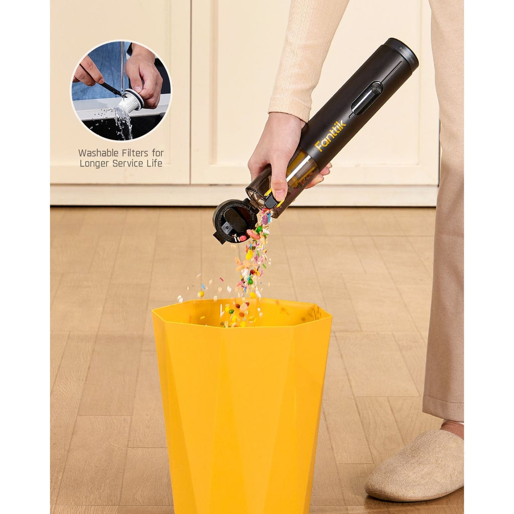 Fanttik Slim V10 Mate cordless car vacuum emptying debris into a trash bin, showing washable filter